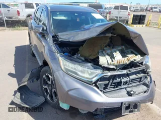 2018 Honda CR-V Touring with VIN 7FARW1H90JE030766, listed as a IAAI auction lot 41637900 with Not Provided miles and . Bid and sale history available at DreamBid. Image 6.