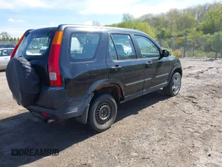 2002 Honda CR-V LX with VIN JHLRD68402C018458, listed as a IAAI auction lot 42206935 with 212,229 mi miles and . Bid and sale history available at carsss.com. Image 4.