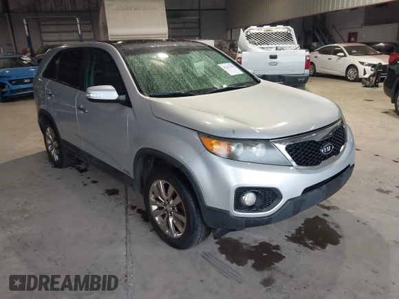 2011 Kia Sorento EX with VIN 5XYKUDA21BG024857, listed as a IAAI auction lot 42243340 with 145,514 mi miles and . Bid and sale history available at DreamBid. Image 1.