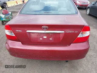 2004 Toyota Camry LE with VIN 4T1BE32K84U307551, listed as a IAAI auction lot 42054571 with 115,513 mi miles. Bid and sale history available at carsss.com. Image 12.