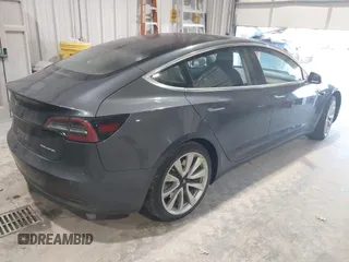 2018 Tesla Model 3 Long Range Battery with VIN 5YJ3E1EB1JF145520, listed as a IAAI auction lot 41360939 with 95,010 mi miles and . Bid and sale history available at DreamBid. Image 4.
