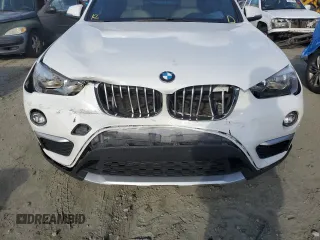 2017 BMW X1 sDrive28i with VIN WBXHU7C38H5H36694, listed as a Copart auction lot 65935442 with 96,213 mi miles. Bid and sale history available at carsss.com. Image 9.