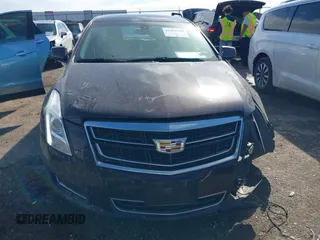 2017 Cadillac XTS with VIN 2G61L5S31H9164023, listed as a IAAI auction lot 41408290 with 59,695 mi miles and . Bid and sale history available at DreamBid. Image 12.