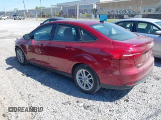 2016 Ford Focus SE with VIN 1FADP3F20GL378468, listed as a IAAI auction lot 41995342 with 59,075 mi miles. Bid and sale history available at carsss.com. Image 3.