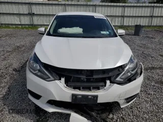 2018 Nissan Sentra SV z VIN 3N1AB7AP8JY249921, wystawiony jako Copart lot #55950335 z przebiegiem 57 560 mil mil oraz Szkoda całkowita • Salvage title. Historia ofert i sprzedaży dostępna na DreamBid. Obrazek 5.