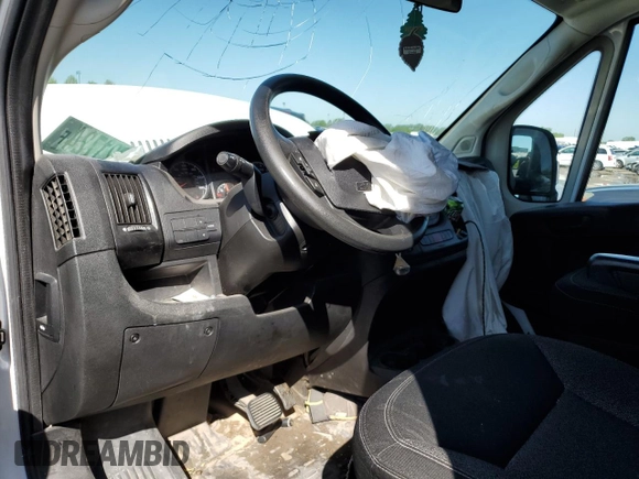 2018 Ram ProMaster Cargo with VIN 3C6TRVAGXJE105060, listed as a Copart auction lot 52821724 with 100,477 mi miles and Salvage Title. Bid and sale history available at DreamBid. Image 8.