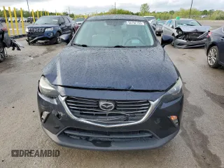 2017 Mazda CX-3 Grand Touring z VIN JM1DKFD75H0141048, wystawiony jako Copart lot #55752185 z przebiegiem 89 960 mil mil oraz Szkody całkowita. Historia ofert i sprzedaży dostępna na DreamBid. Obrazek 5.
