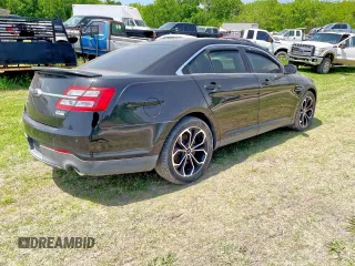 2013 Ford Taurus SHO z VIN 1FAHP2KT6DG144172, wystawiony jako Copart lot #54102495 z przebiegiem Nie podano mil oraz Czysty tytuł • Clean title. Historia ofert i sprzedaży dostępna na DreamBid. Obrazek 4.