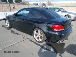 2008 BMW 1 Series 135i with VIN WBAUC73548VF25411, listed as a IAAI auction lot 41479409 with 153,643 mi miles. Bid and sale history available at carsss.com. Image 3.