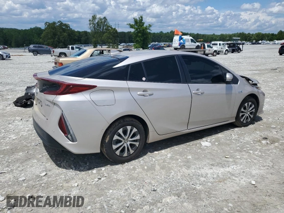 2021 Toyota Prius LE with VIN JTDKAMFPXM3184126, listed as a Copart auction lot 56857675 with 54,676 mi miles and Clean Title. Bid and sale history available at DreamBid. Image 3.