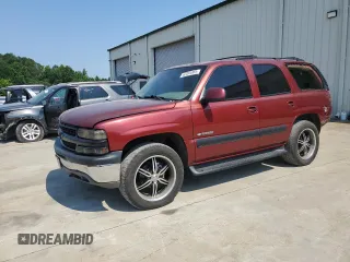 2001 Chevrolet Tahoe LT with VIN 1GNEK13T61R113404, listed as a Copart auction lot 62265065 with 412,638 mi miles and Salvage title. Bid and sale history available at DreamBid. Image 1.