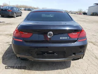 2015 BMW 6 Series 650i z VIN WBA6B2C50FGB99462, wystawiony jako Copart lot #54058515 z przebiegiem 96 662 mil mil oraz Tytuł czysty. Historia ofert i sprzedaży dostępna na DreamBid. Obrazek 6.