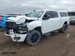 2024 Ram 2500 Laramie with VIN 3C6UR5FJ6RG144334, listed as a Copart auction lot 50008825 with 18,463 mi miles and Salvage Title. Bid and sale history available at carsss.com. Image 1.