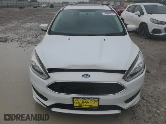 2016 Ford Focus SE с VIN 1FADP3F27GL397700, выставлен на аукционе Copart как лот 59692675 с пробегом 98 188 миль миль и Списание • Salvage title. История ставок и продаж доступна на DreamBid. Изображение 5.