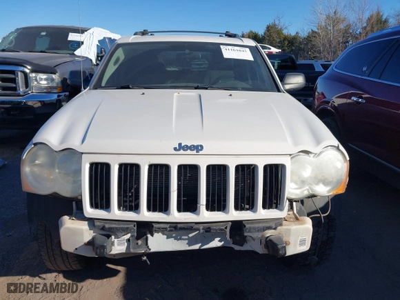 2009 Jeep Grand Cherokee Laredo with VIN 1J8GS48K29C518895, listed as a IAAI auction lot 41161045 with 153,499 mi miles. Bid and sale history available at carsss.com. Image 13.