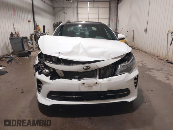 2016 Kia Optima SXL Turbo with VIN 5XXGV4L21GG073147, listed as a IAAI auction lot 41504517 with 130,467 mi miles. Bid and sale history available at carsss.com. Image 12.