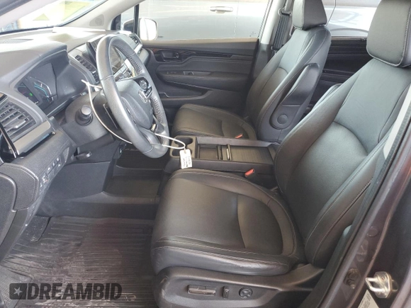 2021 Honda Odyssey Touring with VIN 5FNRL6H88MB040703, listed as a Copart auction lot 60340095 with 66,171 mi miles and Salvage title. Bid and sale history available at DreamBid. Image 7.