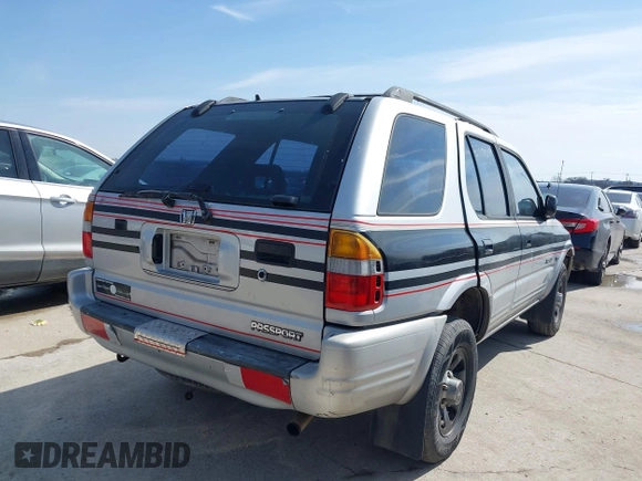 1999 Honda Passport LX with VIN 4S6CK58W3X4423948, listed as a IAAI auction lot 41578294 with 279,429 mi miles. Bid and sale history available at carsss.com. Image 4.