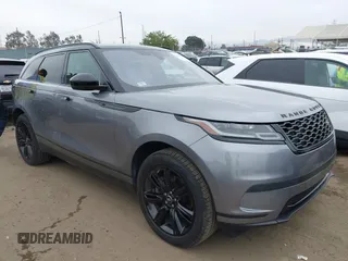 2020 Land Rover Range Rover Velar S z VIN SALYB2FV0LA243665, wystawiony jako IAAI lot #42435290 z przebiegiem 49 129 mil mil oraz . Historia ofert i sprzedaży dostępna na DreamBid. Obrazek 1.