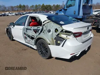 2022 Toyota Camry TRD with VIN 4T1KZ1AK9NU071181, listed as a IAAI auction lot 41758219 with 103,200 mi miles and . Bid and sale history available at DreamBid. Image 3.