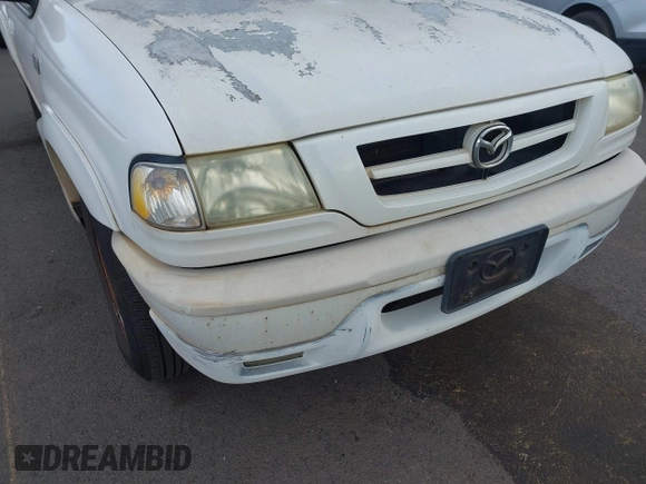 2002 Mazda B-Series Truck DS z VIN 4F4YR16U32TM12981, wystawiony jako IAAI lot #42421997 z przebiegiem 130 610 mil mil oraz . Historia ofert i sprzedaży dostępna na DreamBid. Obrazek 6.