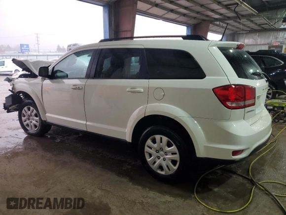 2019 Dodge Journey SE with VIN 3C4PDCBB1KT784133, listed as a Copart auction lot 49765335 with 80,954 mi miles and Salvage Title. Bid and sale history available at DreamBid. Image 2.