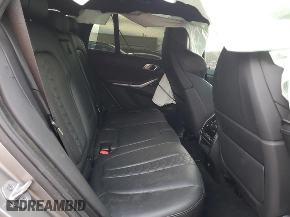 2021 BMW X5 M z VIN 5YMJU0C04M9F64315, wystawiony jako Copart lot #82029464 z przebiegiem Nie podano mil oraz Szkoda całkowita • Salvage title. Historia ofert i sprzedaży dostępna na DreamBid. Obrazek 11.