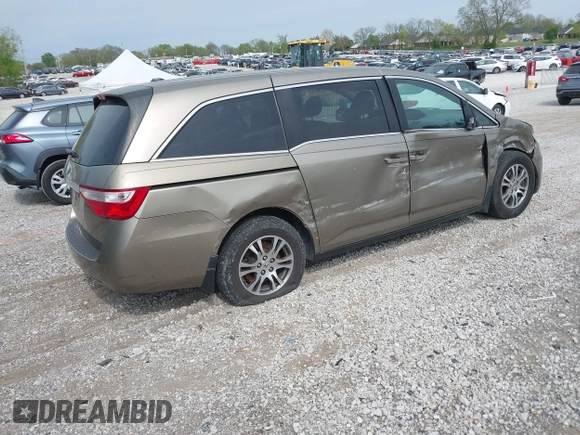 2013 Honda Odyssey EX-L with VIN 5FNRL5H65DB064238, listed as a IAAI auction lot 42050743 with 189,437 mi miles and . Bid and sale history available at carsss.com. Image 4.