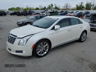 2014 Cadillac XTS Premium z VIN 2G61P5S31E9185440, wystawiony jako Copart lot #53962275 z przebiegiem 174 056 mil mil oraz Szkoda całkowita • Salvage title. Historia ofert i sprzedaży dostępna na DreamBid. Obrazek 1.