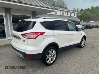 2014 Ford Escape Titanium with VIN 1FMCU9J94EUC63638, listed as a Copart auction lot 55880505 with 198,112 mi miles and Clean Title. Bid and sale history available at DreamBid. Image 4.