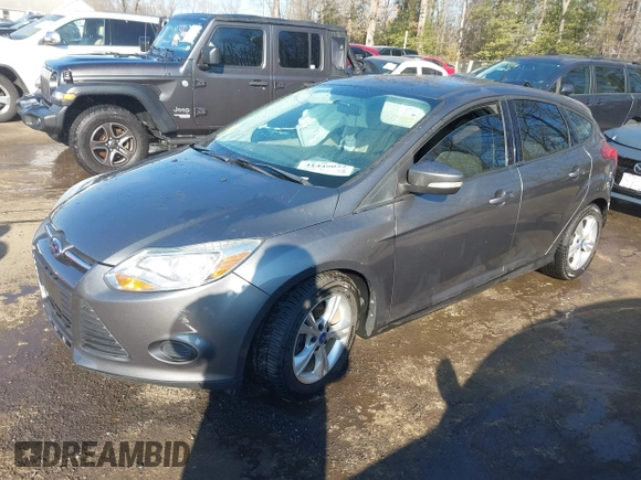 2013 Ford Focus SE with VIN 1FADP3K28DL323879, listed as a IAAI auction lot 41449022 with 133,735 mi miles. Bid and sale history available at carsss.com. Image 2.