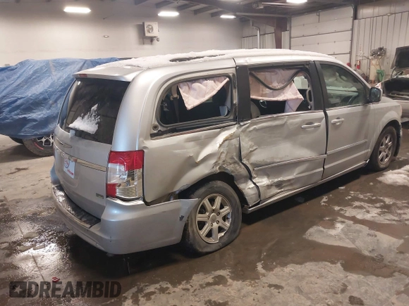 2011 Chrysler Town & Country Touring with VIN 2A4RR5DG0BR735274, listed as a IAAI auction lot 41845820 with 163,440 mi miles and . Bid and sale history available at DreamBid. Image 4.