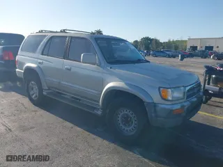 1997 Toyota 4Runner Limited with VIN JT3GN87R3V0043679, listed as a IAAI auction lot 42043029 with 296,834 mi miles. Bid and sale history available at carsss.com. Image 1.