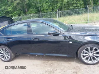 2024 Cadillac CT5 Sport z VIN 1G6DP5RK3R0127081, wystawiony jako IAAI lot #42319697 z przebiegiem 4 093 mil mil oraz . Historia ofert i sprzedaży dostępna na DreamBid. Obrazek 14.