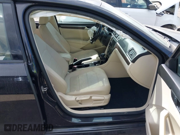 2019 Volkswagen Passat 2.0T Wolfsburg Edition with VIN 1VWLA7A34KC012694, listed as a IAAI auction lot 41579392 with 80,846 mi miles. Bid and sale history available at carsss.com. Image 5.