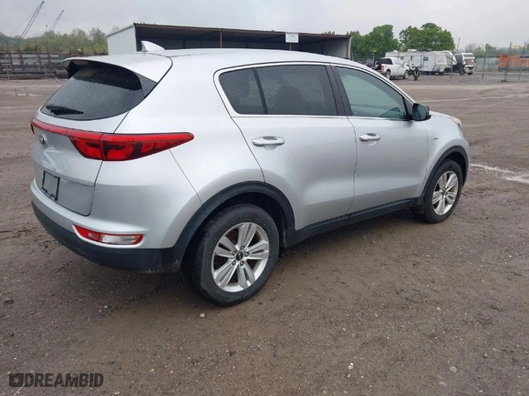2017 Kia Sportage LX with VIN KNDPMCAC1H7140218, listed as a IAAI auction lot 42024024 with 129,799 mi miles. Bid and sale history available at carsss.com. Image 4.