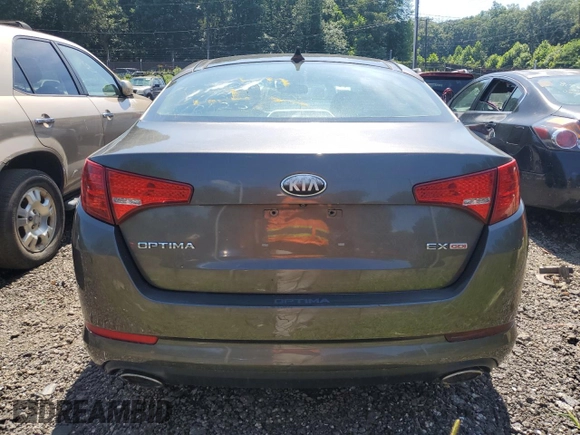 2013 Kia Optima EX с VIN 5XXGN4A72DG180637, выставлен на аукционе Copart как лот 66261835 с пробегом Не указан миль и Списание • Salvage title. История ставок и продаж доступна на DreamBid. Изображение 6.