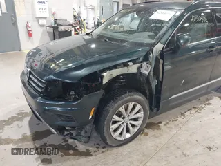2018 Volkswagen Tiguan SEL with VIN 3VV2B7AX8JM113976, listed as a IAAI auction lot 42310576 with 100,319 mi miles and . Bid and sale history available at DreamBid. Image 6.