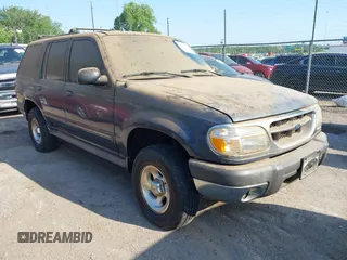 1999 Ford Explorer XL z VIN 1FMZU34XXXUB25039, wystawiony jako IAAI lot #42290828 z przebiegiem 146 874 mil mil oraz . Historia ofert i sprzedaży dostępna na DreamBid. Obrazek 1.