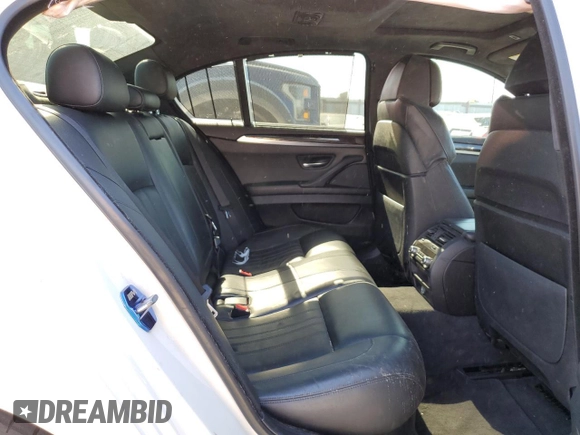 2014 BMW M5 with VIN WBSFV9C57ED097570, listed as a Copart auction lot 88571785 with 100,391 mi miles and Salvage Title. Bid and sale history available at carsss.com. Image 10.