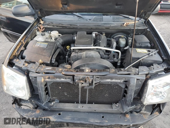 2006 GMC Envoy SLT with VIN 1GKDS13S662220064, listed as a Copart auction lot 84381274 with 237,220 mi miles and Salvage Title. Bid and sale history available at carsss.com. Image 12.