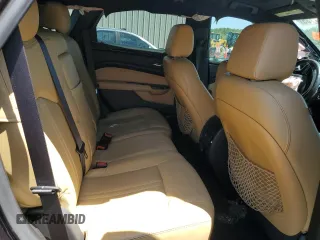 2015 Cadillac SRX Luxury Collection z VIN 3GYFNBE36FS606313, wystawiony jako Copart lot #52767735 z przebiegiem 91 480 mil mil oraz Szkody całkowita. Historia ofert i sprzedaży dostępna na DreamBid. Obrazek 11.