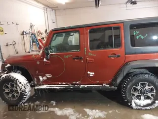 2014 Jeep Wrangler Unlimited Sport with VIN 1C4BJWDG6EL194569, listed as a IAAI auction lot 41549268 with 122,740 mi miles. Bid and sale history available at carsss.com. Image 15.