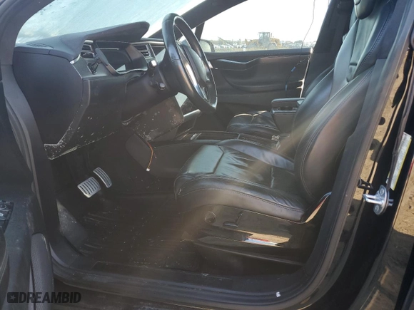 2017 Tesla Model X P100D with VIN 5YJXCBE4XHF040743, listed as a Copart auction lot 74010904 with NaN miles and Salvage Title. Bid and sale history available at carsss.com. Image 7.