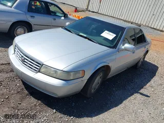 1999 Cadillac Seville Luxury SLS with VIN 1G6KS54Y2XU925322, listed as a IAAI auction lot 41889695 with 150,587 mi miles. Bid and sale history available at carsss.com. Image 2.