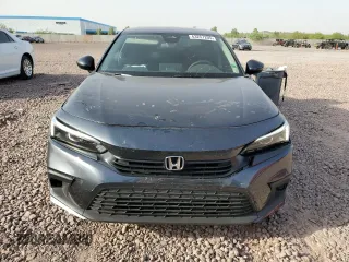 2023 Honda Civic EX with VIN 2HGFE1F7XPH317930, listed as a Copart auction lot 63257205 with 44,600 mi miles and Salvage title. Bid and sale history available at DreamBid. Image 5.