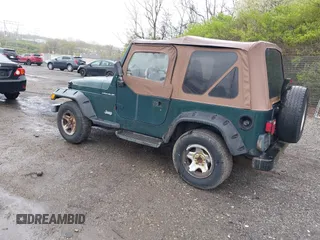 1999 Jeep Wrangler SE with VIN 1J4FY29P9XP467850, listed as a IAAI auction lot 42029322 with 250,884 mi miles. Bid and sale history available at carsss.com. Image 3.
