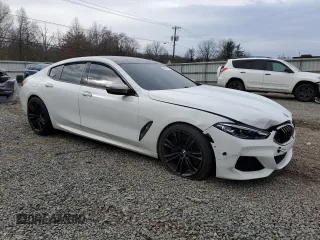 2020 BMW 8 Series M850i with VIN WBAGV8C00LCD80972, listed as a Copart auction lot 46907745 with Not provided miles and Salvage title. Bid and sale history available at DreamBid. Image 4.