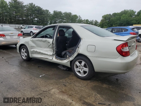 2004 Toyota Camry LE z VIN JTDBE32K940297754, wystawiony jako Copart lot #55809155 z przebiegiem 232 092 mil mil oraz Szkoda całkowita • Salvage title. Historia ofert i sprzedaży dostępna na DreamBid. Obrazek 2.