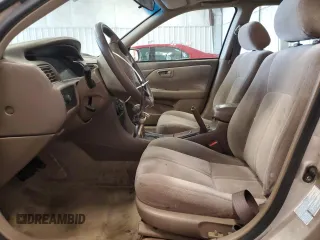 2000 Toyota Camry CE z VIN 4T1BG22K2YU742415, wystawiony jako Copart lot #55763165 z przebiegiem 245 821 mil mil oraz Czysty tytuł • Clean title. Historia ofert i sprzedaży dostępna na DreamBid. Obrazek 7.